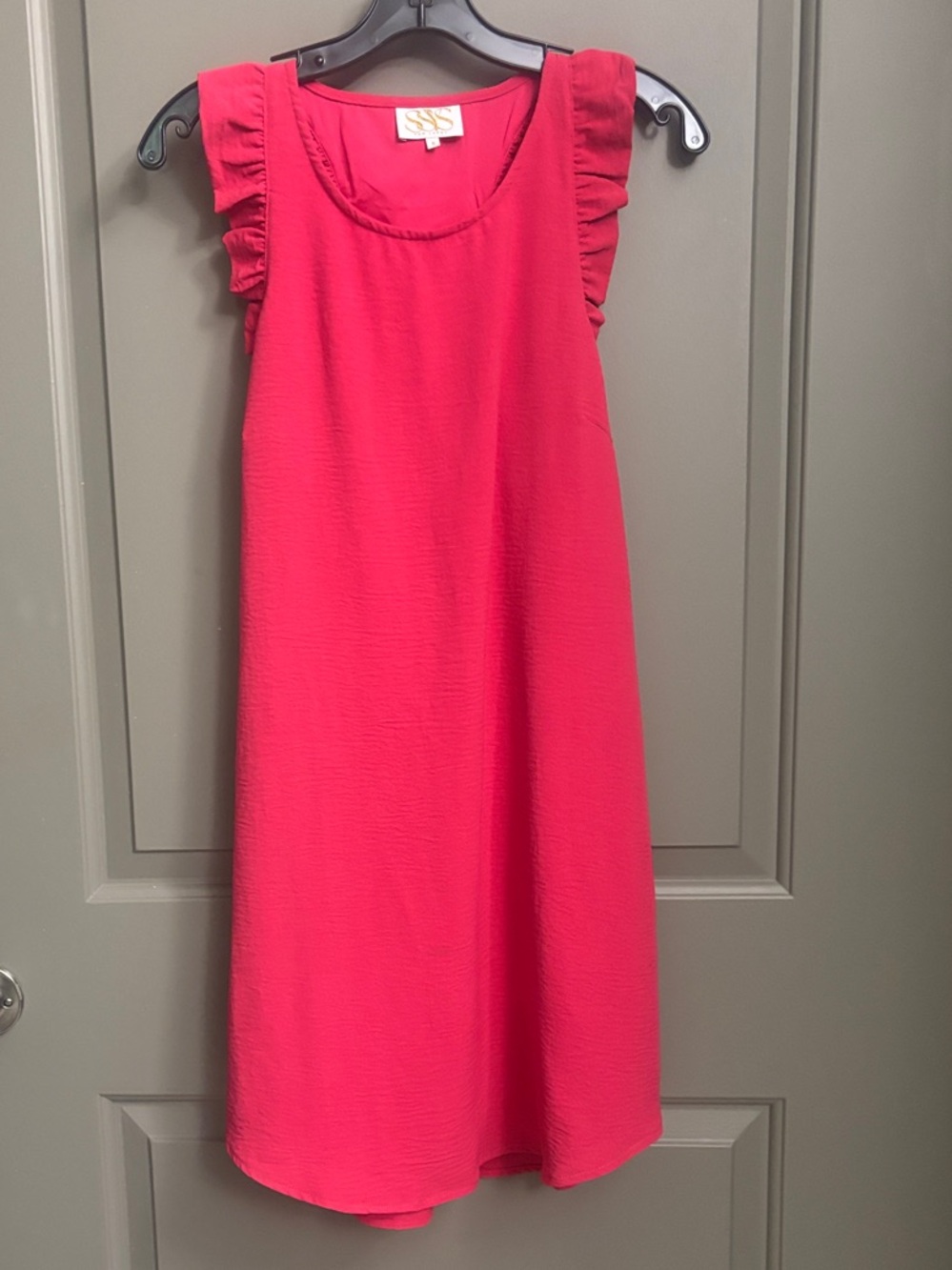 Sleeveless with slight High-Low; Ruffle Shoulders racerback